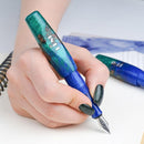 BENU Pixie Emerald Sea Fountain Pen - A Hand Writing On Paper | EndlessPens