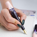 BENU Pixie Plum Cream Fountain Pen - A Hand Writing On Paper | EndlessPens