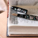 CYPRESS × @micahfinds Victorian Flora: Courageous Chamomile (14K Gold) Fountain Pen On Top Of Notebook | EndlessPens