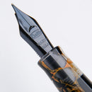 Conklin Mark Twain Crescent Orange Medley with Gunmetal Fountain Pen - Pen Nib Close Up | EndlessPens