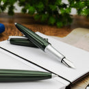 Diplomat Aero Evergreen Fountain Pen - Pen On Top Of Journal | EndlessPens