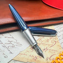 Diplomat Aero Midnight Blue Fountain Pen - Pen on Top of Leather and Papers | EndlessPens