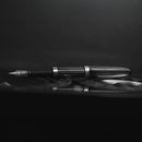 Diplomat Aero Stripes Black Fountain Pen - Pen Laying Horizontally On Black Background | EndlessPens