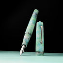 Leonardo Momento Zero 2026 Artica Fountain Pen (Stainless Steel) - Pen and Cap Cover on Dark Background | EndlessPens