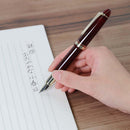 Sailor 1911L Casual Stable Fountain Pen - Muted Red Writing on Paper | EndlessPens